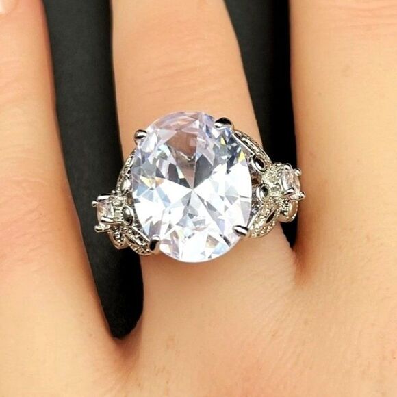.925 Sterling Silver with Large Oval White Diamond Cubic Zirconia Ring Size 9 - Picture 1 of 10